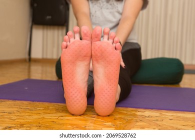 practice of standing on nails. Close-up of a yoga man standing on a sadhu board with sharp nails. Wooden sadhu board with nails for sadhu practice