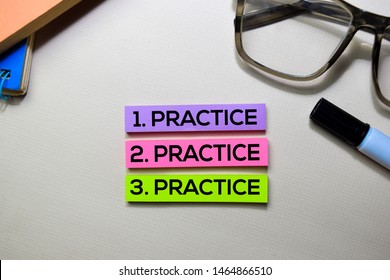 Practice. Practice. Practice text on sticky notes isolated on office desk