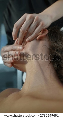 Practitioner skillfully eases muscle tightness during session