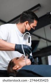 Practitioner Using Portable Scanner To Obtain Precise Dental Impressions For Treatment Planning