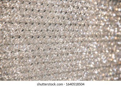 Prague. 10.05.2019: Beautiful shiny diamonds swarovski crystal background. Luxury, wealth. Cover pattern. Macro photo, close up of expensive stones