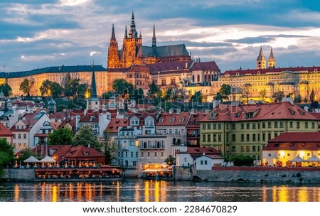 Prague Castle with St. Vitus Cathedral over Lesser town (Mala Strana) at sunset, Czech Republic