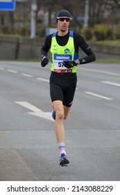 Prague, Czech Republic, 04 02 2022: Male Long Distance Runner On 19th Kilometer Of Sportisimo Prague Half Marathon 2022