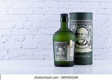 Prague, Czech Republic - 12 January 2021: Bottle of Diplomatico rum in front of white wall. The history of Diplomatico began in Venezuela in1959.