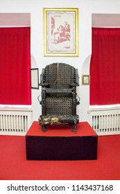 Prague, Czech Republic - 13 February, 2016: The torture chair in the Museum of the Medieval Tortures in the Prague. The inquisition tools.