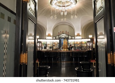 Prague, Czech Republic - 16 August 2017: Bar tender working behind the bar in the lucius art nouveau Interior of the American Bar (Americký bar) inside Obecním domě (The Municipal House).