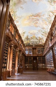 Prague, Czech Republic - 17 August 2017: Library Of The Strahov Monastery, Long Barrel Vault Ceiling Of Philosophical Hall Built In The 17th Century To House Books From Moravian Louka Convent.