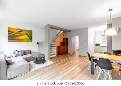 PRAGUE, THE CZECH REPUBLIC, 18.8.2020 - Cozy Living Room In Modern Timeless Style With Fireplace And Wooden Floor