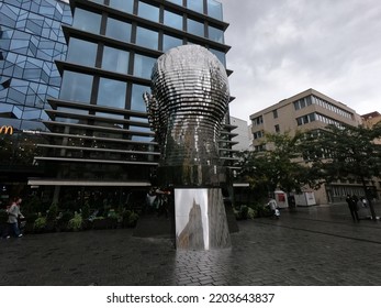 PRAGUE, Czech Republic - AUGUST 1 2022:Franz Kafka-Rotating Head (Otočná Hlava) Prague,Czech Republic, Europe,street Art, Moving Metal Statue,outdoor Sculpture By David Černý-kinetic Sculpture