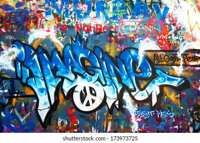 PRAGUE, CZECH REPUBLIC - AUGUST 18, 2011: John Lennon Wall On Kampa Island Famous For Graffiti Made By Beatles Fans