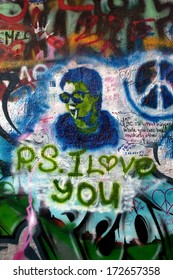 PRAGUE, CZECH REPUBLIC - AUGUST 23, 2012: John Lennon Wall On Kampa Island, Famous For Graffiti Made By Beatles Fans.