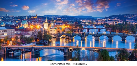 Prague, Czech Republic bridges panorama with Charles Bridge and Vltava river at night