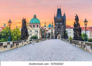Prague, Czech Republic. Charles Bridge (Karluv Most) and Old Town Tower at sunrise.