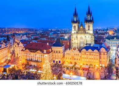 Prague, Czech Republic. Christmas Market On Old Town Square With Gothic Tyne Cathedral.