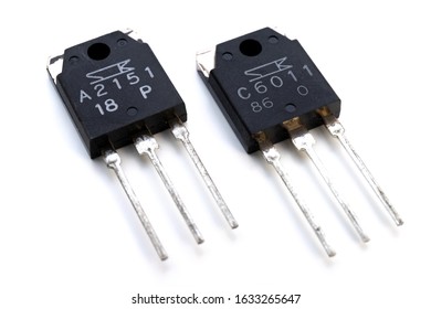 PRAGUE, CZECH REPUBLIC – February 02, 2020: Pair of PNP 2SA2151 and NPN 2SC6011 transistors by SanKen laid on white background