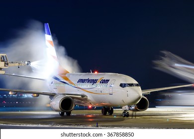 PRAGUE, CZECH REPUBLIC - JANUARY 21: Smart Wings Boeing 737-7Q8 during de-icing at PRG Airport on January 21, 2016.Smart Wings is a brand of the Czech Travel Service Airlines.
