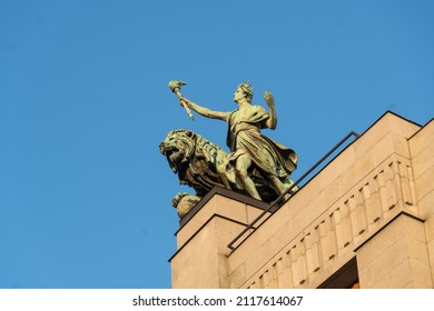 Prague, Czech Republic - July 22, 2020: Statue on the building of the Czech National Bank (Česká národní banka)