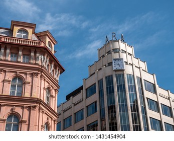 Prague, Czech Republic - June 10 2019: Classic And Modern, Old And New Architecture Meeting In Prague, Czech Republic. Modernist ARA Building And Its Classicist Neighbor. A Concept For Changes Or