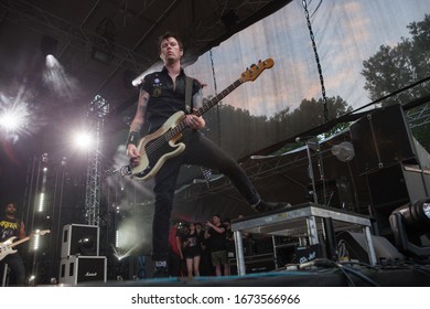 PRAGUE, CZECH REPUBLIC- JUNE 18 2019: Canadian Bass Guitarist Jason McCaslin Plays On A Stage With His Band Sum 41 In Prague, Czech Republic