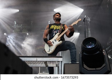 PRAGUE, CZECH REPUBLIC- JUNE 18 2019: Canadian Guitarist Dave Baksh Plays On A Stage With His Band Sum 41 In Prague, Czech Republic