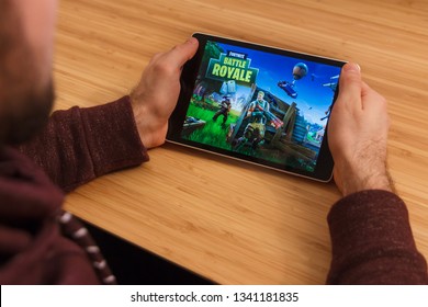 Images Photos Et Images Vectorielles De Stock De Fortnite - prague czech republic march 16 2019 man holding a smartphone and playng