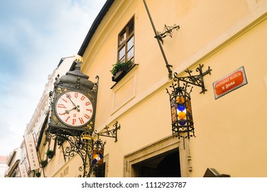 Prague, Czech Republic - May 22, 2018: Facade Of The Building And Clock Of The Famous And Ancient U Fleku Brewery