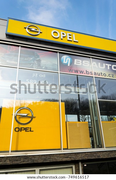 PRAGUE, CZECH REPUBLIC - NOVEMBER 5: Opel car\
company logo on dealership building on November 5, 2017 in Prague.\
PSA Group plans to cut the number of models and rein in discounts\
at its Opel division.