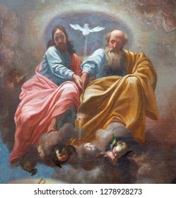 PRAGUE, CZECH REPUBLIC - OCTOBER 12, 2018: The baroque painting of Holy Trinity in church kostel Svatého Tomáše by  Karel Škréta (1610 - 1674).