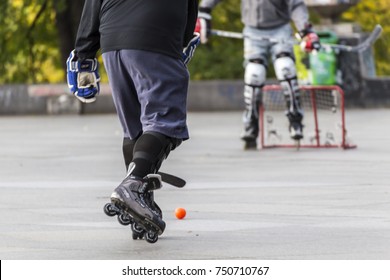 PRAGUE, CZECH REPUBLIC - OCTOBER 12, 2017 - Low angle view of people playing street hockey in Letna Park in Prague, Czech Republic.