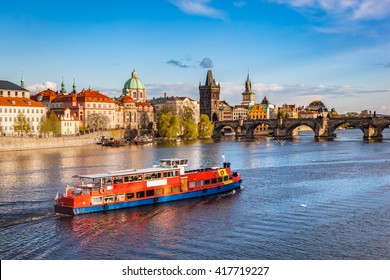 Prague, Czech Republic skyline with historic Charles Bridge. Boat cruise on Vltava river - Shutterstock ID 417719227