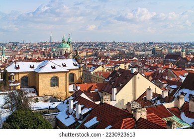 Prague, Czech Republic. Winter Prague with Mala Strana district in the foreground and districts of the right bank of Vltava river in the background. High angle view from the Prague Castle.