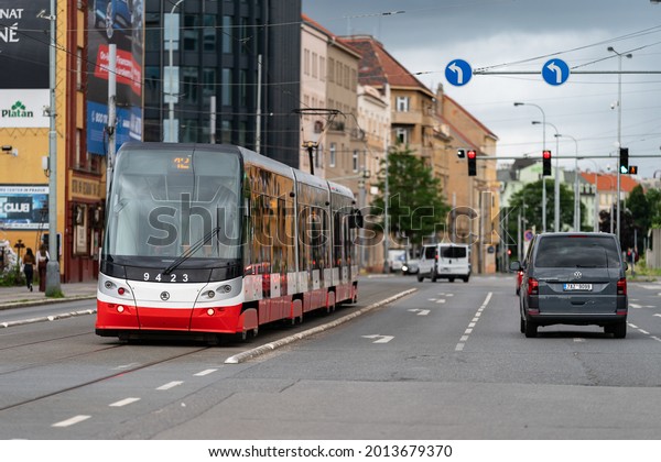 Prague, Czechia - 20.7.2021: Tramway\
For City in Prague street. New Czech red tram number 12 in Prague.\
Public transport in the capital of the Czech\
republic.