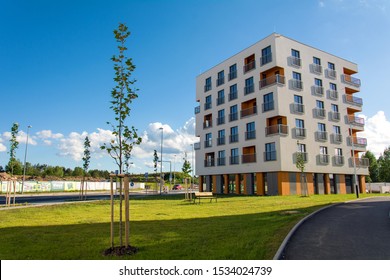 Prague, Czechia - July 23, 2017:Apartment House Exterior Design. Real Estate Concept Of Modern Living In City Suburbs. Small Solitaire Apartment Building Surrounded By Park. Luxury Condominium Housing