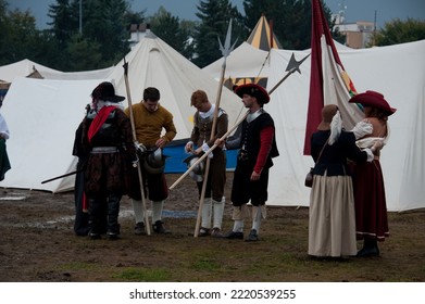 PRAGUE, CZECHIA - Sep 20, 2014: Halberdiers With Halberd, A Pole Weapon, At Bivouac Tents, During Historical Re-enactment Of The 1620  Battle Of White Mountain.