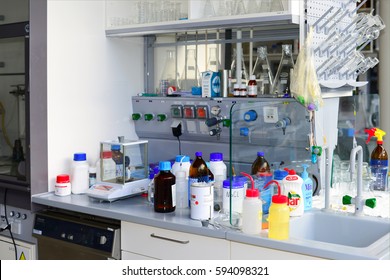PRAGUE, December 3, 2016: Many bottles of solvents and reagents for cell culture on a shelf in laboratory. Institute of Organic and Biochemistry Academy of Sciences the Czech Republic