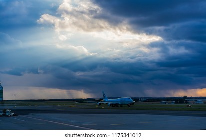 Prague, Václav Havel Airport, Czech Republic. July 11, 2018. Korean Air Aircraft Takeoff At Dusk Just Before The Arrival Of A Storm With Heavy Rains.