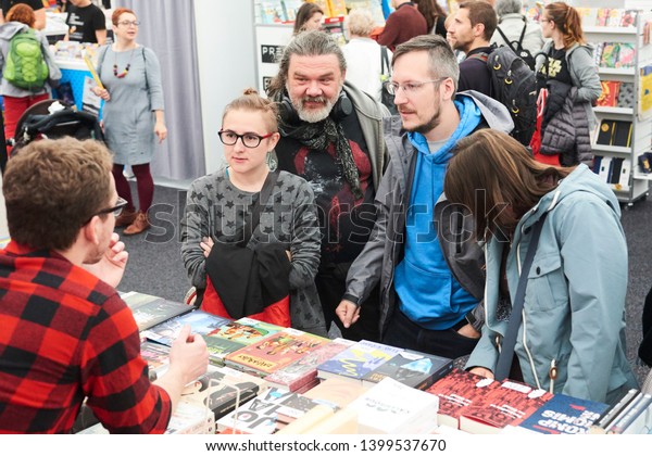 PRAGUE - MAY 12, 2019: Book World Prague 2019 -\
25rd International Book Fair and Literary Festival. Book World\
festival visitors interested in\
books