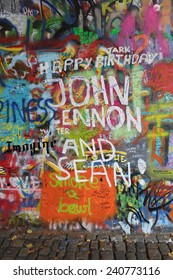 PRAGUE - OCTOBER 13, 2014 - Prague John Lennon Wall, Czech Republic. Since The Death Of John Lennon Wall Has Been Filled With Graffiti With Lyrics From Beatles Songs And Pictures Describing Love And Peace