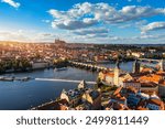 Prague scenic spring aerial view of the Prague Old Town pier architecture Charles Bridge over Vltava river in Prague, Czechia. Old Town of Prague with the Castle in the background, Czech Republic.