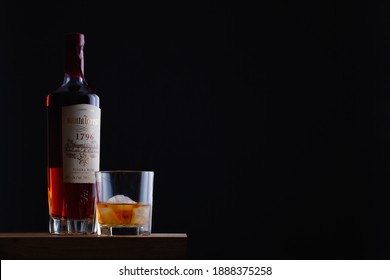 Prague,Czech Republic - 4 January,2021:   Bottle Of Run Santa Teresa On The Wooden  Table. It Is The First Of Venezuela, With More Than Two Hundred Years Of Tradition Of Fabrication Of Aged Rums.