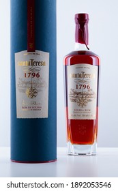 Prague,Czech Republic - 9 January,2021:   Bottle Of Run Santa Teresa On The Wooden  Table. It Is The First Of Venezuela, With More Than Two Hundred Years Of Tradition Of Fabrication Of Aged Rums.