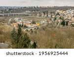 Prague,Czech republic Real estate residential concept.Czech architecture view from above.Panoramic city skyline.Barrandov Bridge and old railway stone bridge in Hlubocepy.Traditional Czech development