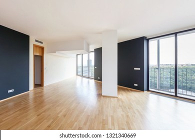 PRAHA, CZECH -  MARCH 2014: Modern white empty loft apartment interior with parquet floor and panoramic windows, Overlooking the metropolis city