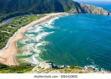 Praia da Lagoinha do Leste, FlorianÃ³polis, Morro da Coroa, view from above, green water, sand, waves and forest.  Beautiful Brazil - Powered by Shutterstock