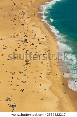 Similar – Aerial View From Flying Drone Of People Crowd Relaxing On Algarve Beach In Portugal