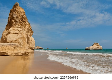 Praia dos Tres Castelos during the sunny day. Town Portimao in Algarve region, Portugal - Shutterstock ID 2257566993