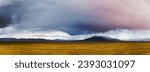 prairie landscape before the storm, panoramic view of autumn pasture in qinghai province, China