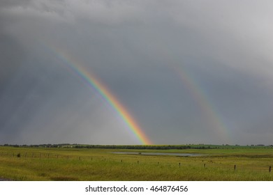 Prairie Storm With Rainbow