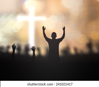 worship hands raised cross