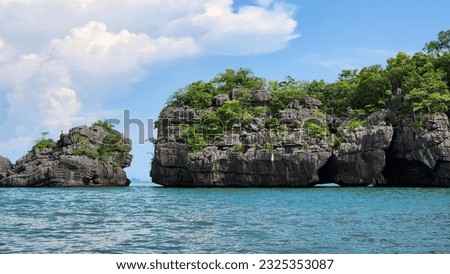Prasat Hin Pan Yot The beach and the emerald waters are hidden among the strange-looking rocks that look like thousands of spire castles at Ban Bo Chet Luk. In the area of ​​Mu Koh Petra National Park